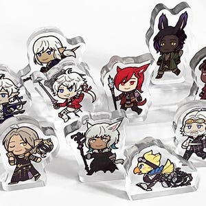 May include: A collection of twelve clear acrylic standees featuring chibi-style anime characters with diverse hair colors, outfits, and poses. Each figure is printed on a transparent base, showcasing detailed illustrations of various fantasy-inspired figures.