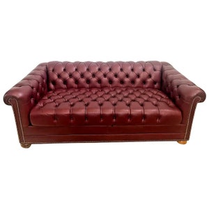 Vintage Chesterfield Leather Sofa Sleeper Rolled arms and back tufted seat