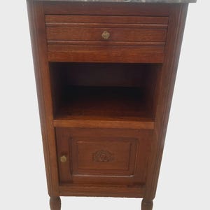 May include: A rustic wooden sign with the text "Welcome" in a handwritten style. The sign is painted white with a distressed finish, and features a decorative floral element in the corner. Perfect for a front door or entryway.