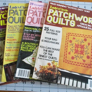 May include: Four vintage Lady's Circle Patchwork Quilt magazines with colorful covers featuring quilting patterns and instructions. The covers feature titles like "Regional Quilts", "Step-by-Step Quilting Lesson", "25 Full Size Patterns", and "Patchwork Quilts Great Big Applique Issue".