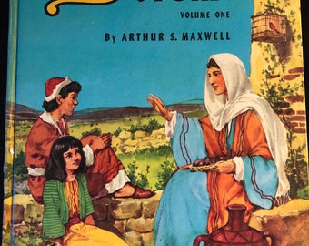 L'histoire de la Bible, volume 1. Par Arthur S. Maxwell, rédaction en 1953. En bon état vintage. Une fissure sur le dos (voir photo).