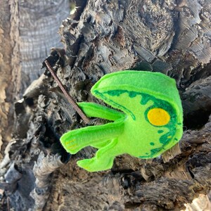 This frog has painted acrylic details.