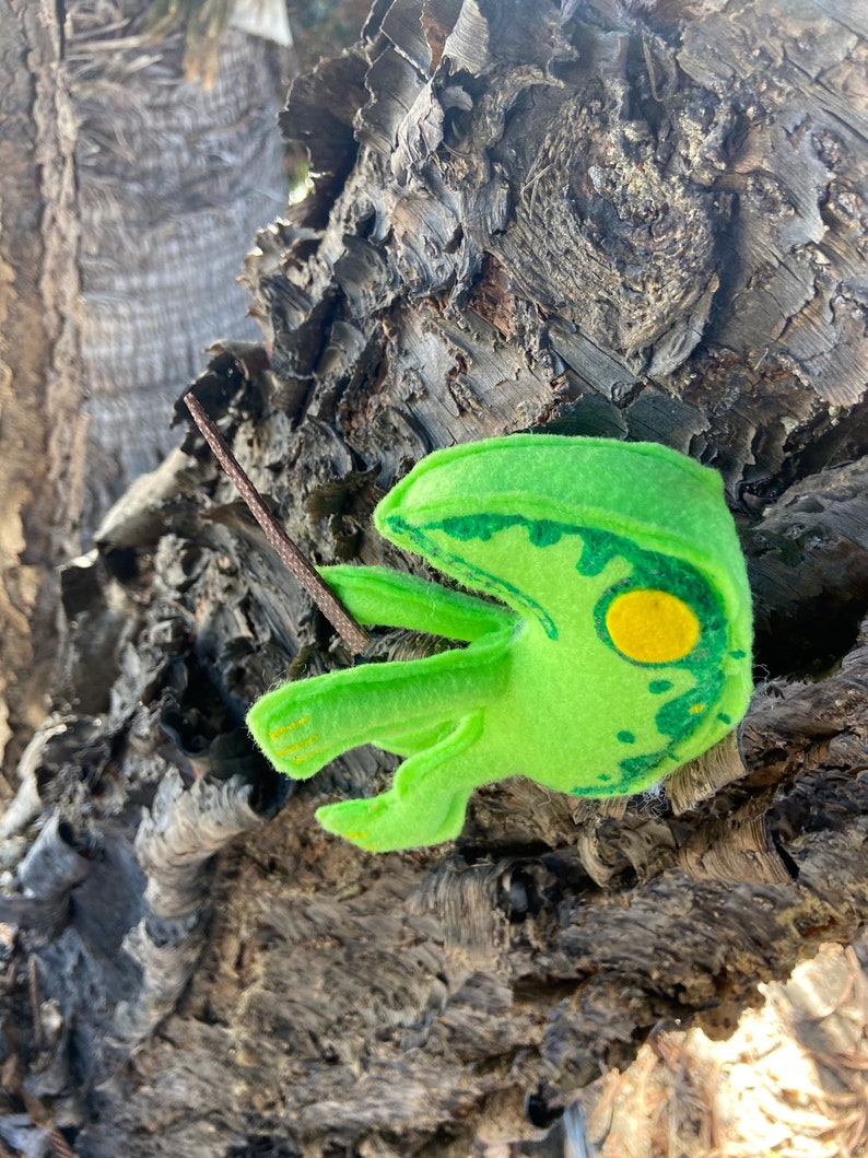 This frog has painted acrylic details.