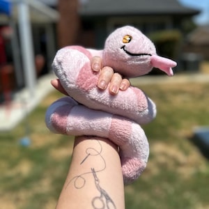 Snake plushie, rose colored snake, danger noodle