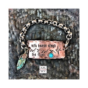 With brave wings she flies- hand stamped bracelet