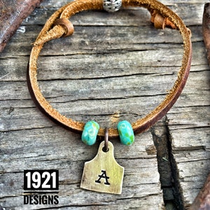 Tiny cow tag adjustable leather bracelet