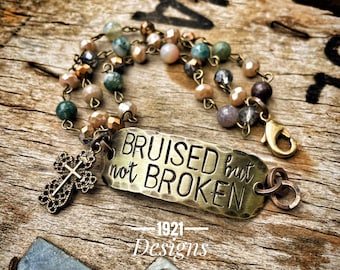 Bruised but not broken- hand stamped