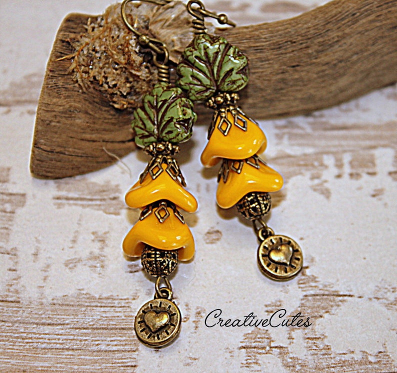 Earthy Bohemian Hippie Earrings Sunflower Yellow Flower Earrings Rustic Green Leaf Czech Bead Earrings Boho Bronze Heart Dangles Dangles