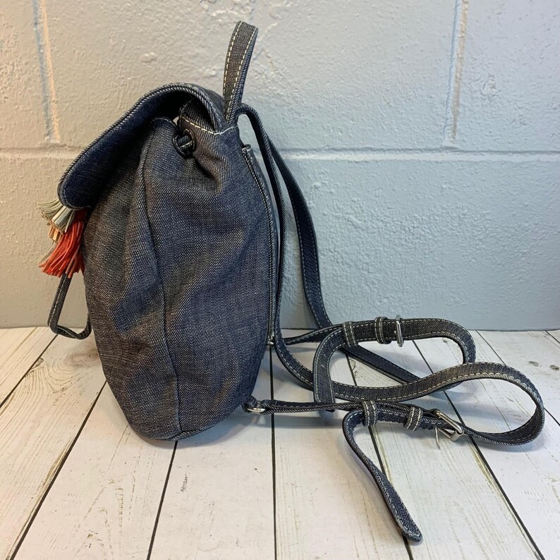 Rebecca Minkoff Sofia Drawstring Backpack Denim Multi-Color Tassels immagine 3