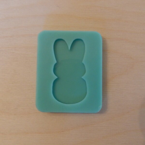 Basic Bunny Rabbit Silhouette Silicone Mold for Resin and Epoxy.  Sized for use on Badge Reels 2" or 2 1/2" High.  1/8" (3mm) deep.