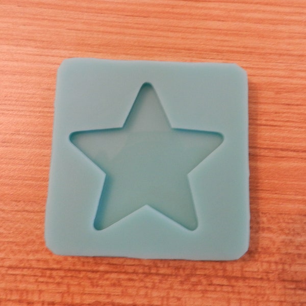 Star 5 Points Silicone Mold for Resin and Epoxy.  Sized for use on Badge Reels. 2" at largest dimension.  1/8" (3mm) deep.  Shiny Mold