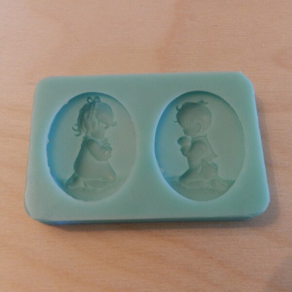 Praying Children Cameo Silicone Mold.  30mm x 40mm (about 1 1/4" x 1 1/2") used for jewelry making use with resin and epoxy