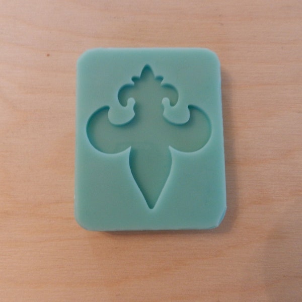 Fleur de lis Silicone Mold for Resin and Epoxy.  Sized for use on Badge Reels. 2" High.  1/8" (3mm) deep.  Shiny Mold. Also 2 1/2" and 3"