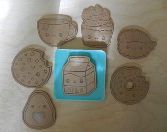 2" Etched Happy Food Silicone Mold for Resin and Epoxy.  Sized for use on Badge Reels. 2" at widest dimension 1/8" deep.