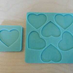 Heart Silicone Mold for Resin and Epoxy.  Sized for use on Badge Reels.  2" at largest dimension.  1/8" (3mm) deep.  Also other sizes