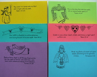May include: Six colorful cards with angel illustrations and inspirational bible verses. Each card features a different verse and a black and white angel drawing. The cards are yellow, green, blue, pink, purple, and turquoise.