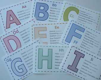 May include: A set of alphabet flashcards with colorful letters and words describing positive attributes. Each card features a different letter of the alphabet and a list of words that start with that letter, such as "Almighty, Awesome, Above All God, Always Watch" for the letter A.