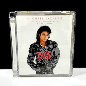 May include: A rustic wooden sign with the text "Welcome to our home" in white lettering. The sign features a distressed finish and a simple, inviting design, perfect for front door decor.