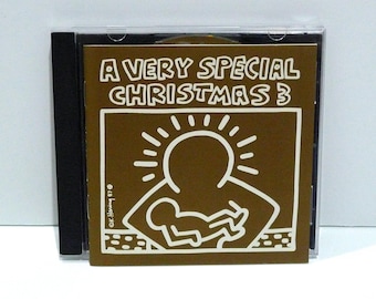A Very Special Christmas 3 CD - Keith Haring Gold Cover 1997 Compact Disc / Smashing Pumpkins, No Doubt, Enya, Chris Cornell / Mohawk Music