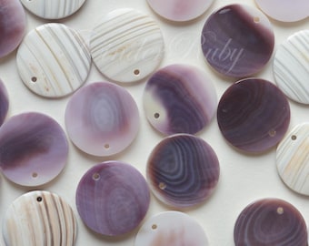 May include: Assortment of round, flat, iridescent shell discs with holes for hanging. The shells are in shades of white, purple, and brown with swirling patterns.