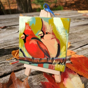 A Cardinal Bird Couple. For the Bird Lover on your list, a one-of-a-kind painting of these magnificent birds by Ashley Wolff