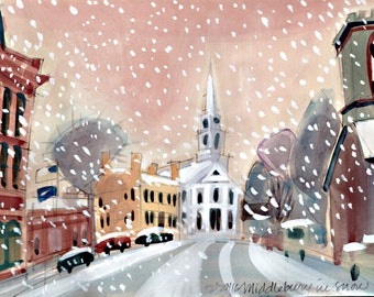 Snowy Day in Downtown Middlebury, Vermont. An early snowstorm blankets a quaint New England town.