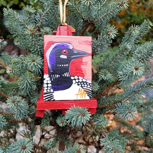 Common Loon Ornament. For the Bird Lover on your list, a one-of-a-kind painting of this magnificent bird by Ashley Wolff