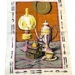 May include: A vintage tea towel with a colorful illustration of a teapot, coffee grinder, oil lamp, and a cup and saucer. The background is a warm orange color with a green and yellow plate. The border of the towel is lined with a repeating pattern of forks, knives, and spoons.
