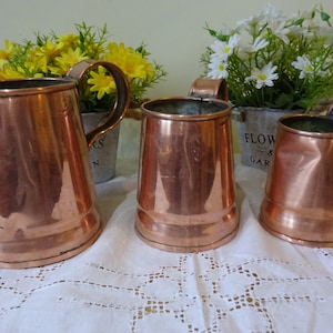 3 Copper tankards graduated tankards quart / pint/ half pint mugs
