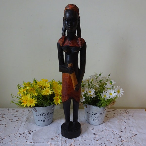 Hand carved wooden statuette of a tribal Massai warrior made of solid hard wood  Masai  African warrior 46 x 8 x 7 cm