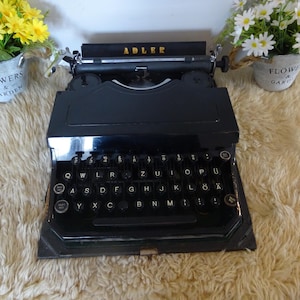 Vintage Adler favorit Typewriter in lovely working condition including case portable typewriter circa 1930&#39;s