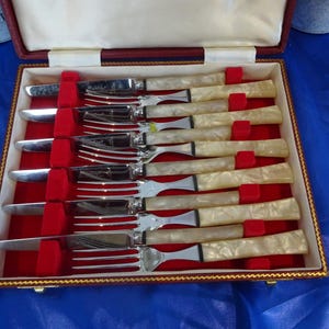 Vintage Harrods of London cutlery set with mother of pearl handles 12 pieces in stunning condition Circa 1930