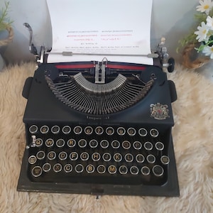 Vintage Imperial good companion typewriter in fantastic condition fully working with a carry case also in good solid  condition