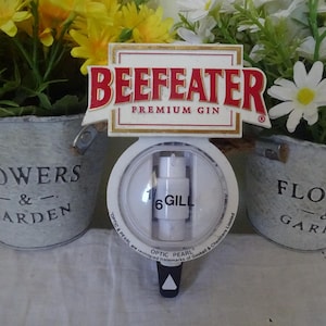 Dispensador de ginebra Beefeater vintage en buen estado de funcionamiento, dispensador de chupitos de ginebra para bar o pub.