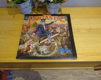 Elton John Captain Fantastic & The Brown Dirt Cowboy LP with original song sheet including original wall poster all in very nice  condition