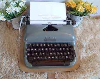Vintage Optima Pullman portable typewriter in great condition full working order made in East Germany