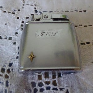Vintage Ronson cigarette lighter initialed F.G.J  gas lighter in fantastic condition