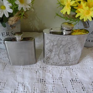 Two stainless steel hip flasks 5oz & 3 oz one engraved southern comfort