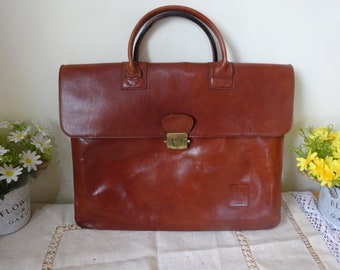Stunning Sereta brown leather brief case / attache case complete with shoulder strap