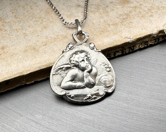 Pendentif ancien ange gardien en argent : médaillon Raphael, gravé « Paul »