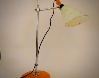 Handcrafted adjustable mid century table lamp.