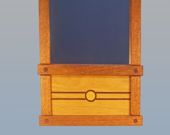 mahogany mirror with yellowheart panel and inlaid mahogany accents