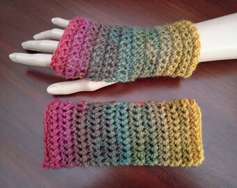Wrist warmers, fingerless gloves, mitts. Green, yellow purple.