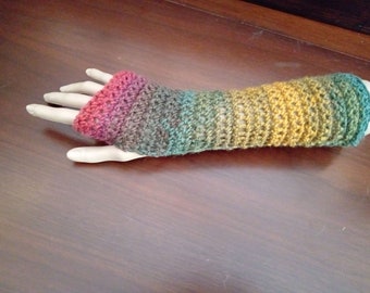 Wrist warmers, fingerless gloves, mitts. Green, yellow purple, red.