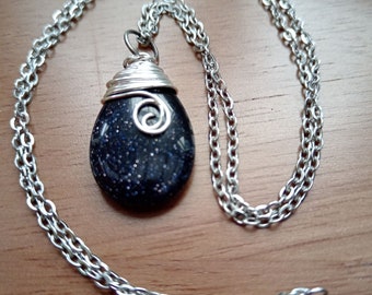 Blue gold stone necklace pendant. Wire wrapped in silver. Energy. Courage. Uplifting. Confidence.