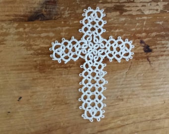 white tatted cross bookmarker