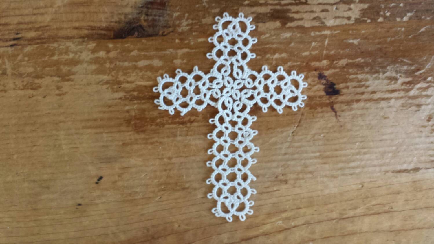 White tatted cross bookmarker