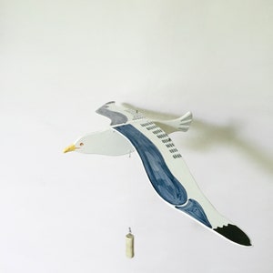 Flying wooden seagull