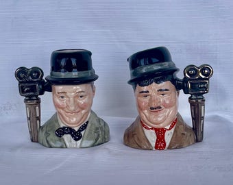 Jarrones con forma de cabeza de Laurel y Hardy de Royal Doulton, numerados 1085/ jarrones con forma de cabeza vintage