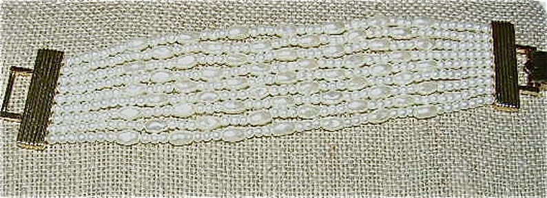 NAPIER Nine-Strand Vintage Faux Pearl Bracelet